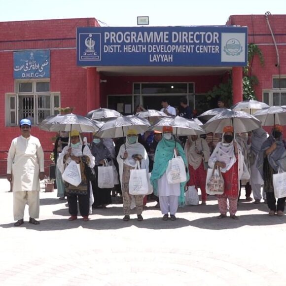 Provision of Heatwave prevention Kits to Lady Health Worker having excessive exposure to sunlight in UHI, printed with messages in District Layyah Punjab Pakistan